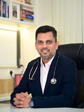 Dr Amit Lala Khomane